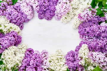 Fototapeten Floral pattern of pink lilac branches, flowers background. Flat lay, top view. © Laima
