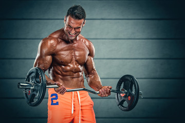 Fototapeta na wymiar Muscular Men Lifting Weights