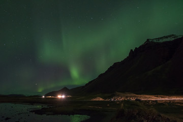 Fototapeta na wymiar Aurora Borealis in icelandic countryside area of Hornafjordur