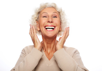 lifestyle, emotion and people concept: Grey haired old nice beautiful laughing woman. Isolated over vwhite background