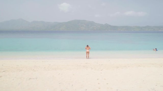 Distant Shot of Woman in Bikini on Beach in Chouchou Bay, Haiti