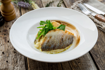 Fried sea bass with risotto