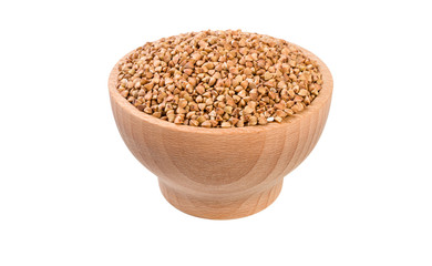 roasted buckwheat  in wooden bowl isolated on white background. nutrition. food ingredient.
