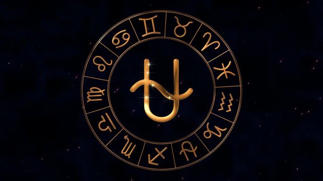 Golden zodiac horoscope spinnig wheel with Ophiuchus sign in center