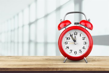 Retro alarm clock on   background