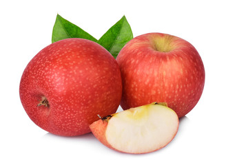 two whole and half pink lady apple with green leaf isolated on white background