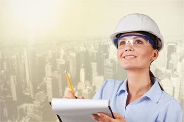 Portrait of young student of architecture  on background