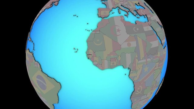 Closing in on Gambia with embedded national flag on blue political 3D globe. 3D illustration.