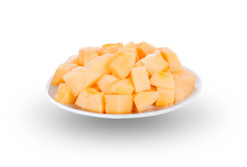 melon slices in white plate isolated on white background