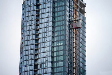 Elevator on a skyscraper construction site in downtown Montreal, Quebec. The lifts are used to...