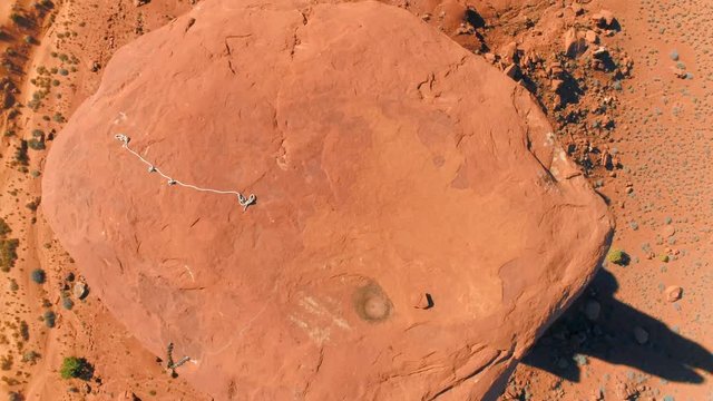 MONUMENT VALLEY, ARIZONA, USA. Top view of sandstone piled up in tower. A wide expanse straddling the border of the U.S. states of Arizona and Utah.