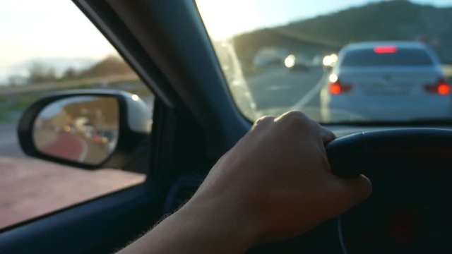 first-person view. Driving a car in rush hour