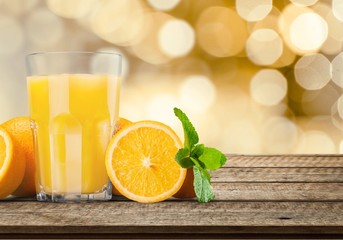 Orange juice and slices of orange on background © BillionPhotos.com