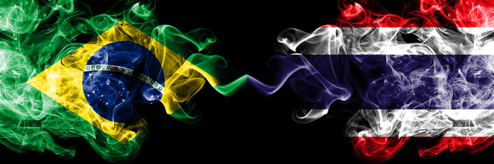 Brazil vs Thailand, Thai smoke flags placed side by side. Thick colored silky smoke flags of Brazilian and Thailand, Thai
