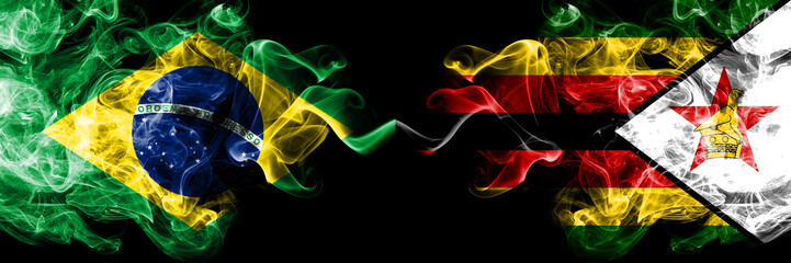 Brazil vs Zimbabwe, Zimbabwean smoke flags placed side by side. Thick colored silky smoke flags of Brazilian and Zimbabwe, Zimbabwean