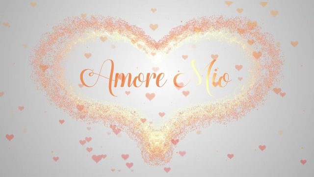 Amore Mio Love confession. Valentine's Day heart made of pink splash isolated on light pink embellished with little cute red heart background. Share love.
