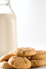 Milk and Peanut Butter Cookies on a White Background