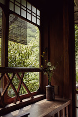 Traditional Japanese design elements on a corner window ledge in Kyoto, Japan