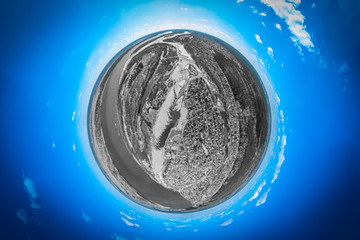 Helicopter drone shot. Aerial photography of a small village with villas and cottages, river, beach,forest and roads. Panoramic city 360  shot from above