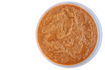 Curry is Thai cooking ingredients in plastic box isolated on white background included clipping path.