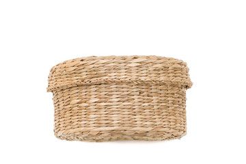 Small wicker basket with top on a white background