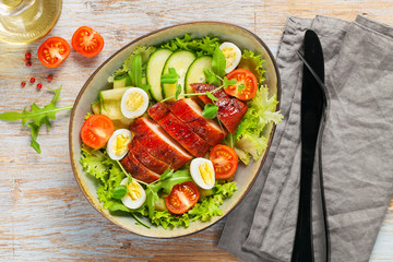 Chicken meat and vegetables salad.