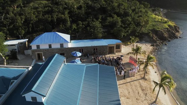 Aerial Pan Left to Right: Solemn Wedding Happening at Norman Island in Norman Island, British Virgin Islands