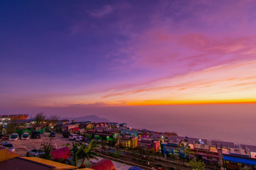The atmosphere of the resort along the hill and the morning sky purple In the tourist season in Thailand