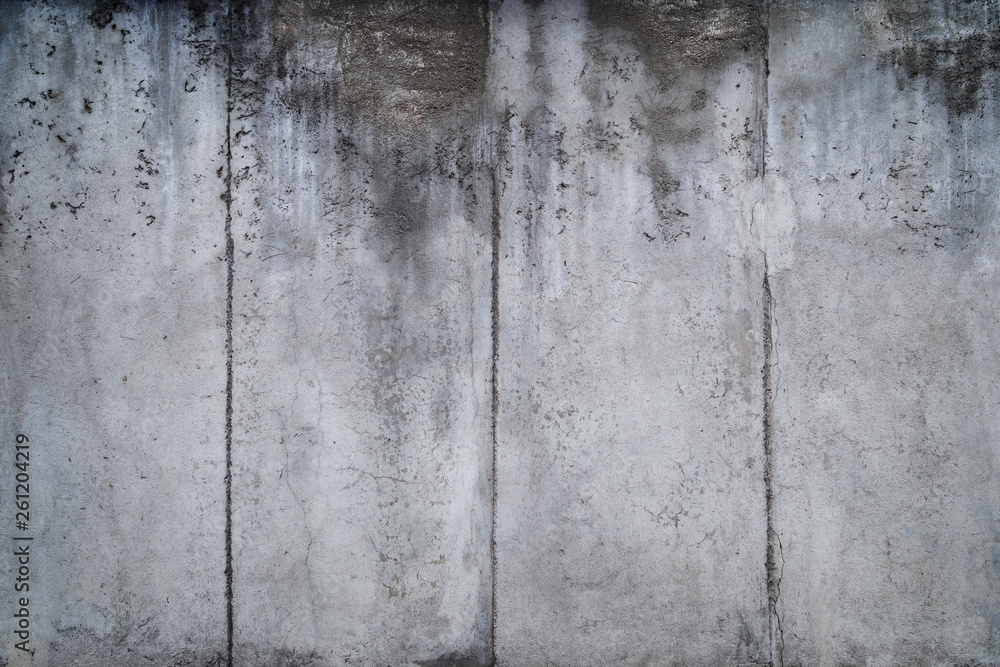 Poster close-up of a weathered and aged gray concrete wall with vignette. full frame texture background of 
