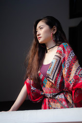 Portrait of thai china adult bohemian girl relax and smile