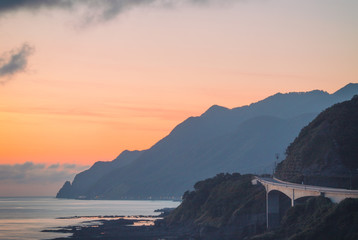 sunset in mountains and ocean