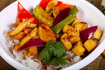 Wok with rice, cheese and tofu