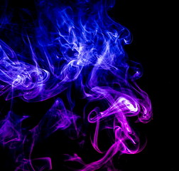 Colored smoke on black background