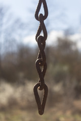 Old hanging rusty chain.
