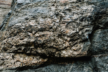 Stone texture background. The surface of granite and basalt. a large rock, a stone wall. close up....