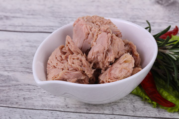 Tasty canned tuna fish in the bowl