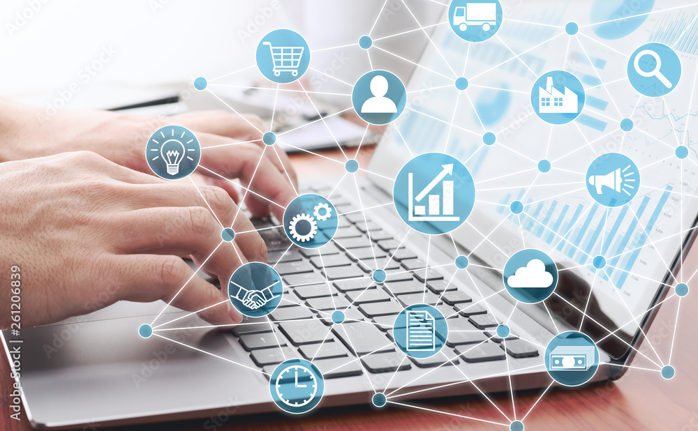 Aufkleber Businessman using laptop for analyzing data. Enterprise resource planning concept. Business structure and many business icons.