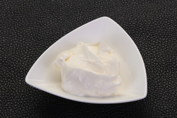 Sour cream in the bowl