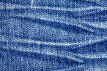 Jeans torn denim texture background.