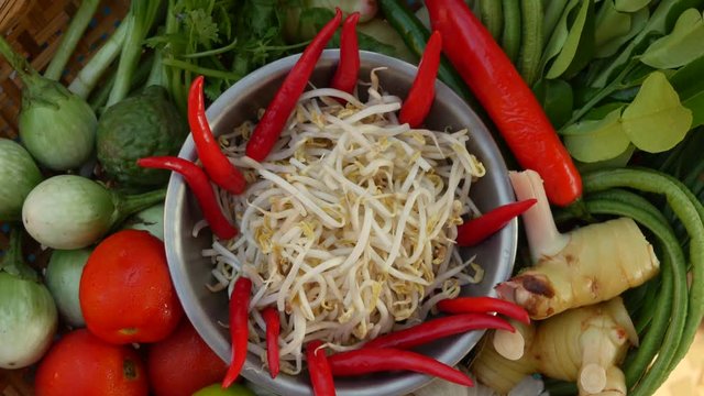 A basket with some fresh vegetables on the table. Close-up. 4k