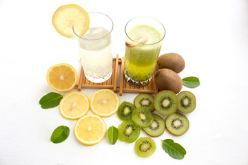 glass of lemon juice white lime and kiwi juice on white background