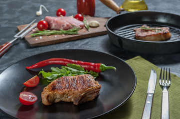 Grilled juicy pork fillet on plate