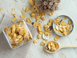 Cornflakes caramel in glass bottle.