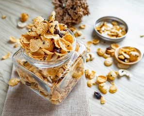 Cornflakes caramel in glass bottle.