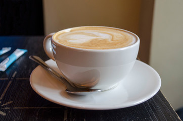 Morning cup of fresh coffee close up