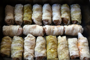Home made food. Prepared for baking sarmi. Traditional meal with rice-stuffed cabbage leaves for Christmas Eve.