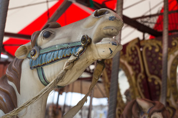 merry-go-round wooden horses. ride a carousel