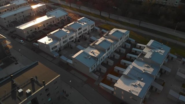 Aerial footage of newly developed apartements in suburb Orgryte torp at sunset in Gothenburg, Sweden