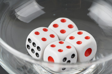 a dice in a glass