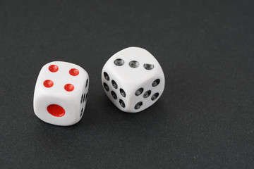 a dice over black surface